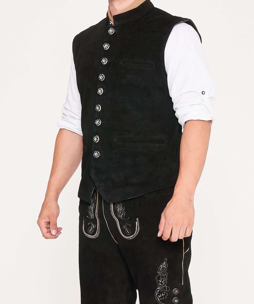 Man in black waistcoat and black embroidered Lederhosen. - Lederhosen For Sale