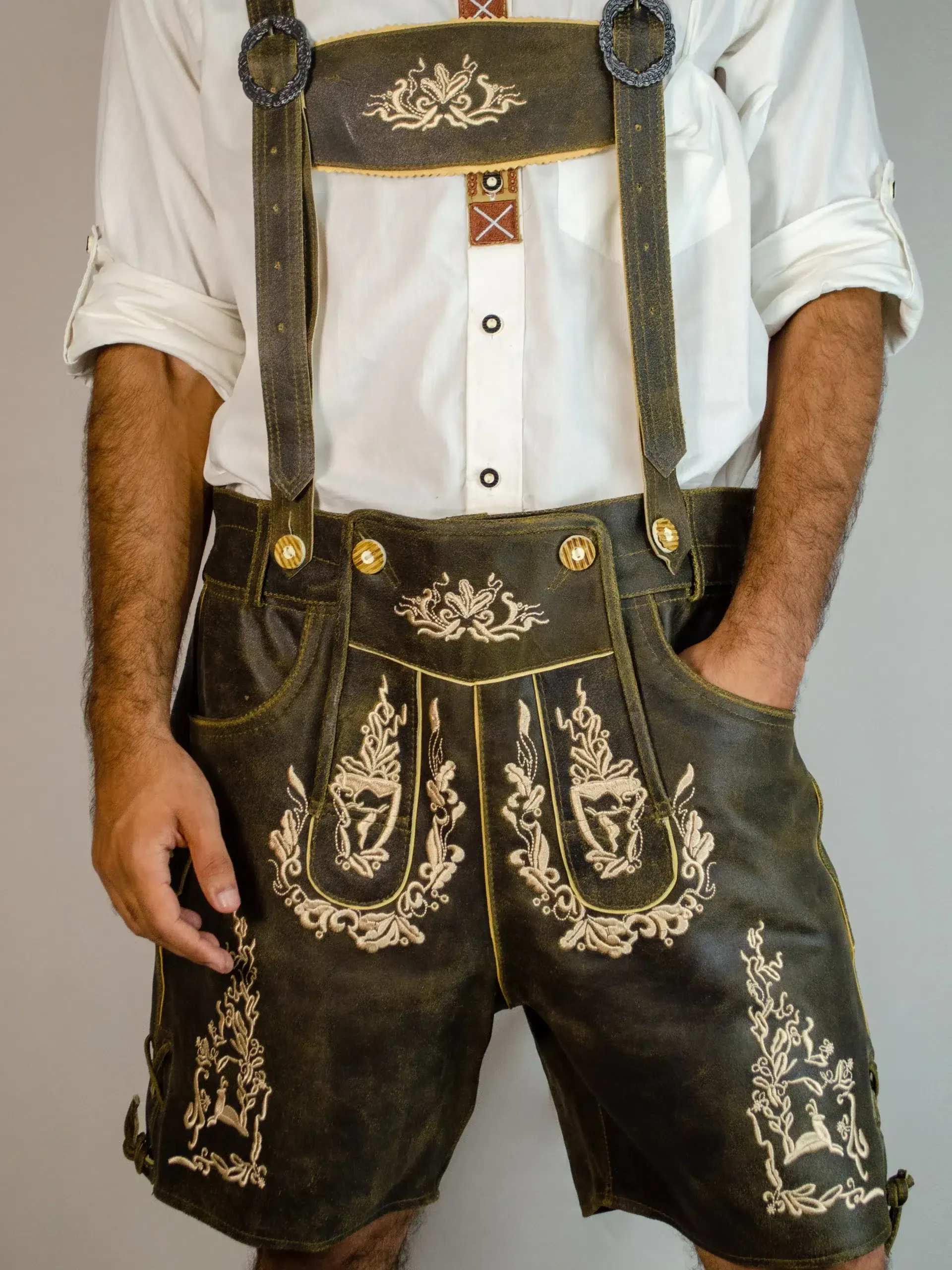 Close-up front view of brown embroidered Lederhosen with suspenders. - Lederhosen For Sale