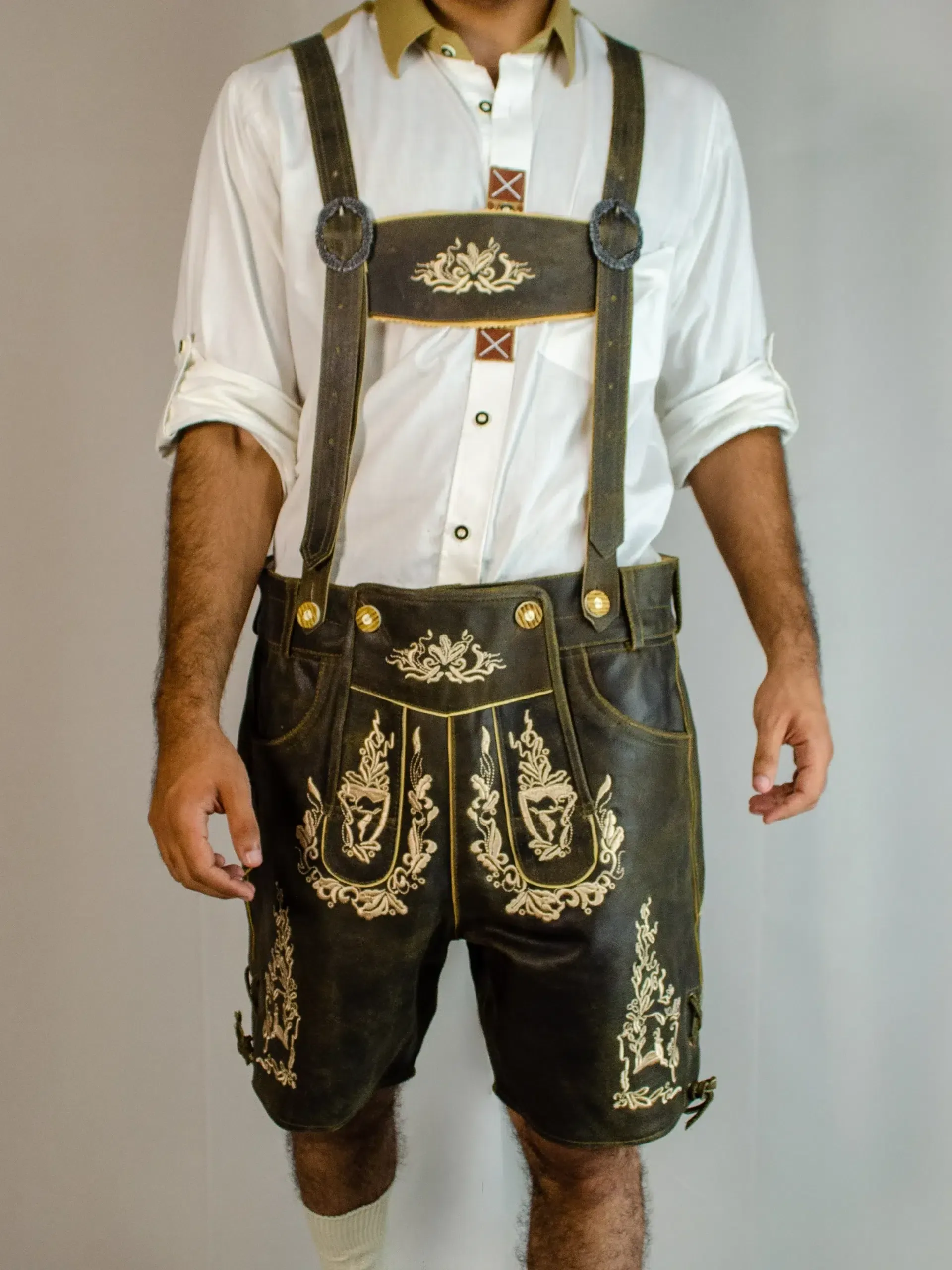 Front view of man in dark brown embroidered Lederhosen and white shirt. - Lederhosen For Sale