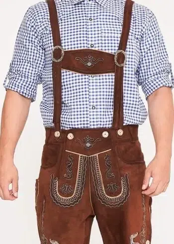 Man standing in shaded brown Lederhosen with checkered shirt. - Lederhosen For Sale