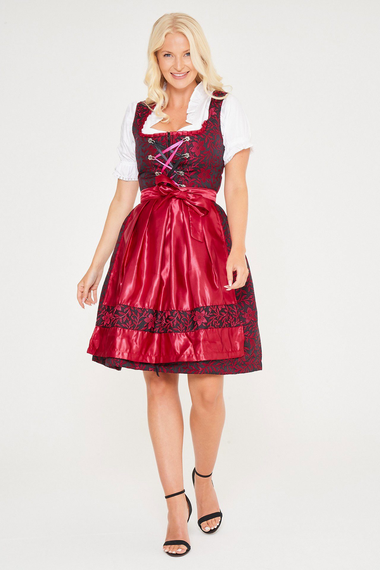 Blonde woman in red Alpentrachten Dirndl with apron. - Lederhosen For Sale