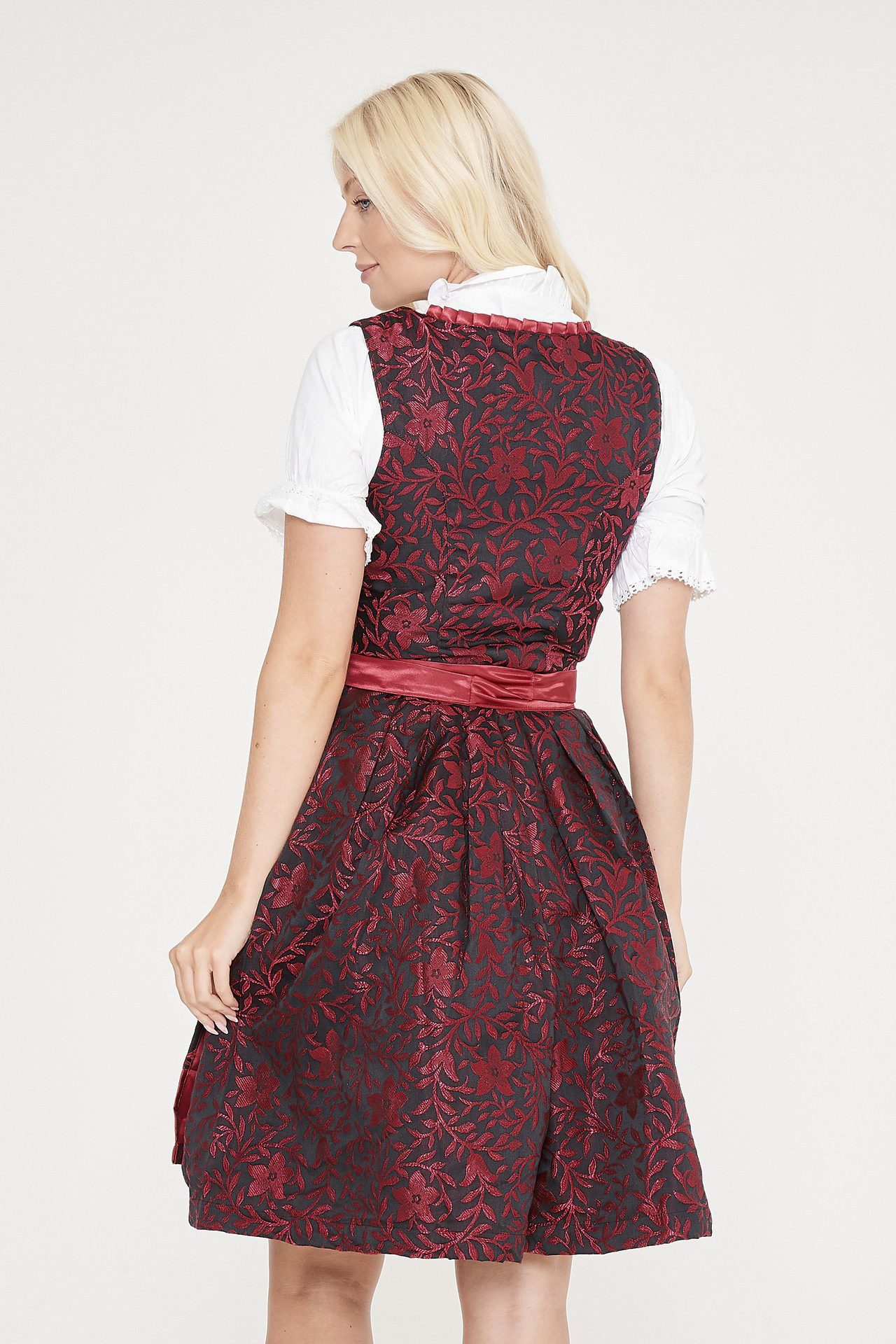 Back view of blonde woman in midi red Dirndl. - Lederhosen For Sale